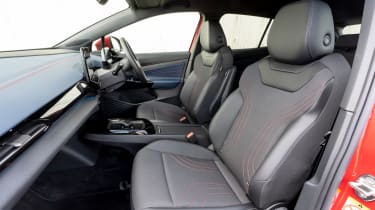 Toyota bZ4X vs Volkswagen ID.4 vs Hyundai Ioniq 5: VW ID.4 interior (passenger door view)